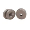 Four circular samarium cobalt magnets, showing the front and back respectively
