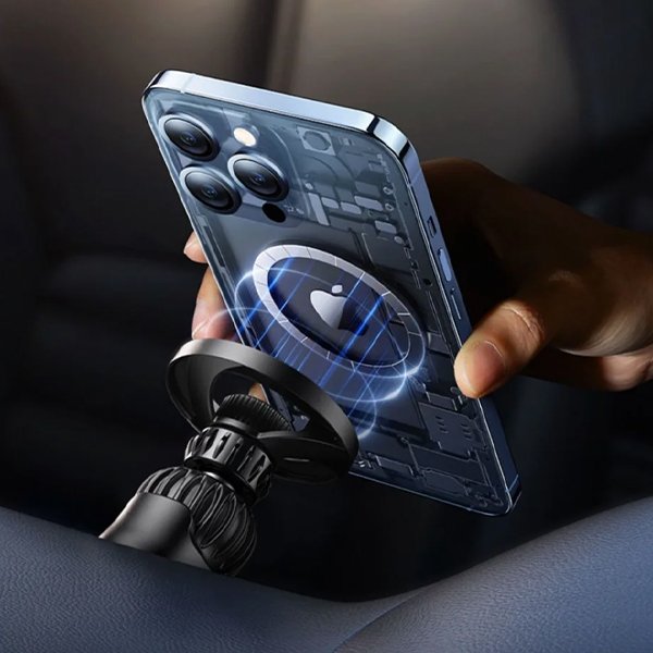 Phone attached to car mount, Magsafe magnet creates a magnetic connection for wireless charging, showcasing seamless integration in automotive use