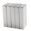 Neodymium Magnets in various shapes (disc, block, ring), demonstrating versatility for custom magnetic applications