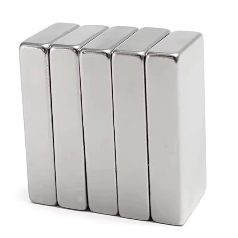 Neodymium Magnets in various shapes (disc, block, ring), demonstrating versatility for custom magnetic applications