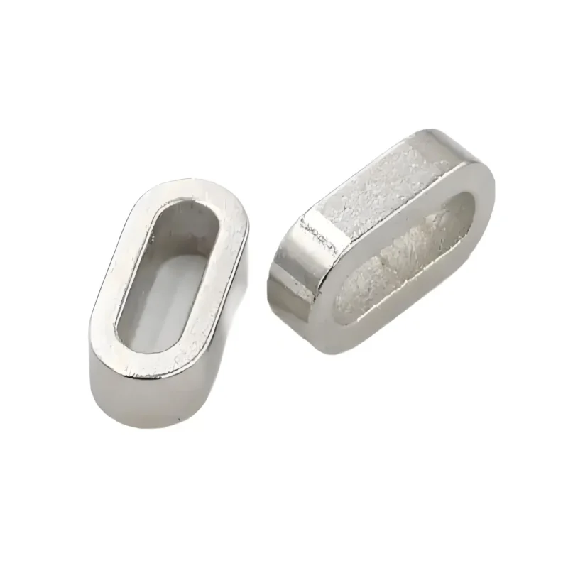 Pair of neodymium magnet magnets in irregular shape, nickel - coated for electronics & industrial use.