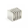Ndfeb n52 cube magnets with spacer for controlled magnetic interaction