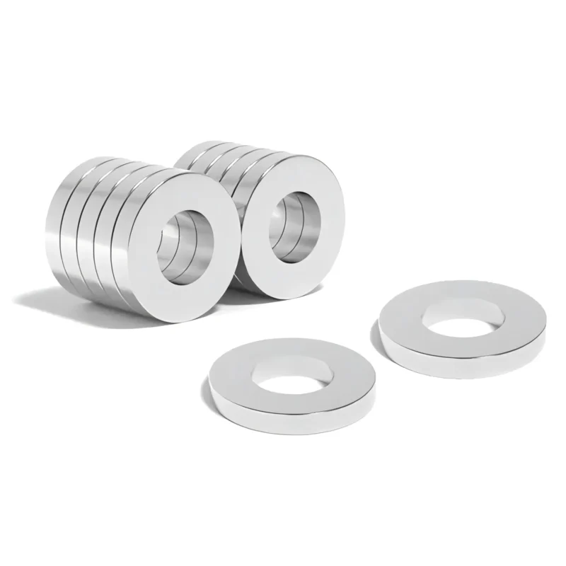 Angled tiny neodymium magnet ring demonstrating magnetic force for speaker magnet applications, with customized coating options.