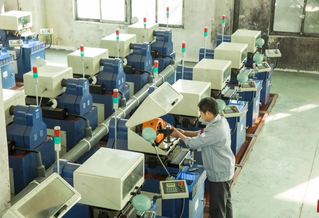 Production Workshop – Automation & Precision Interior of CORT Magnet’s production workshop, featuring rows of automated slicing machines and orderly workflow.
